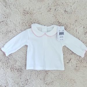 White long sleeve shirt with scalloped Peter Pan collar with pink detail